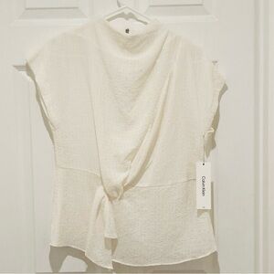 NWT Calvin Klein SIZE S Women's White Drape Blouse. Little red paint? On front